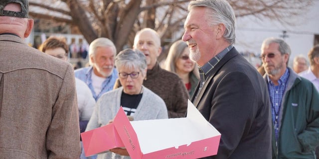 Republican Senate candidate Joe O'Dea of ​​Colorado hands out donuts to voters outside the state GOP assembly, on April 9, 2022 in Colorado Springs, Colorado