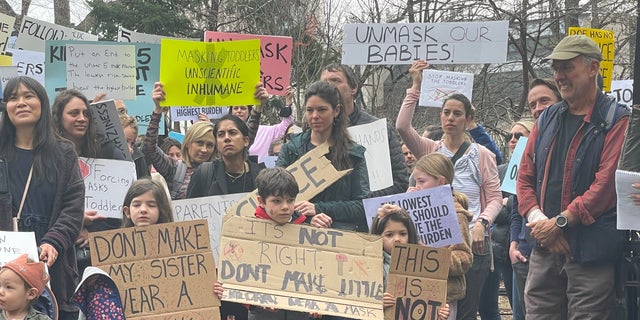 NYC parents protest mask mandates at City Hall March 7, 2022.