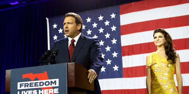 Florida Gov.  Ron DeSantis gives a victory speech after defeating Democratic gubernatorial candidate Rep. Charlie Crist while his wife Casey DeSantis looks on during his election night watch party.